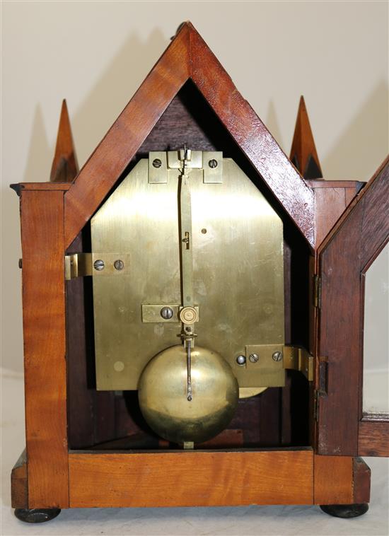 An early Victorian ebony and satinwood mantel timepiece, 13.5in.